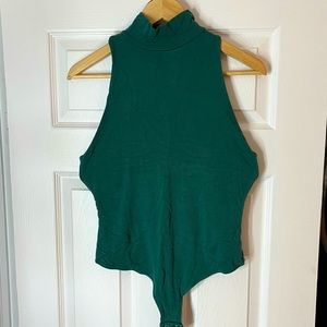 Sexy back shown green body suit